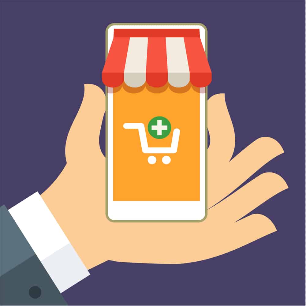 Graphic-of-hand-holding-phone-with-ecommerce-symbol